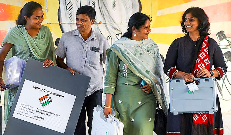 Ballot buddies: Polling officials during the Telangana assembly elections last year | PTI