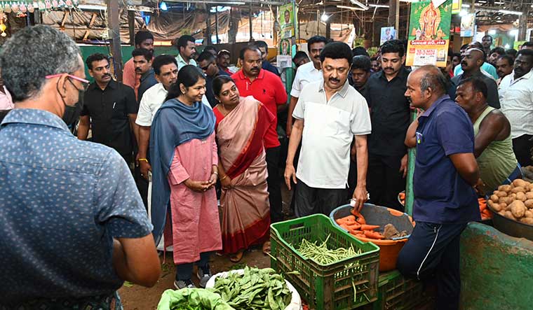 Votes in the basket: Stalin and Kanimozhi campaigning in Thoothukudi.