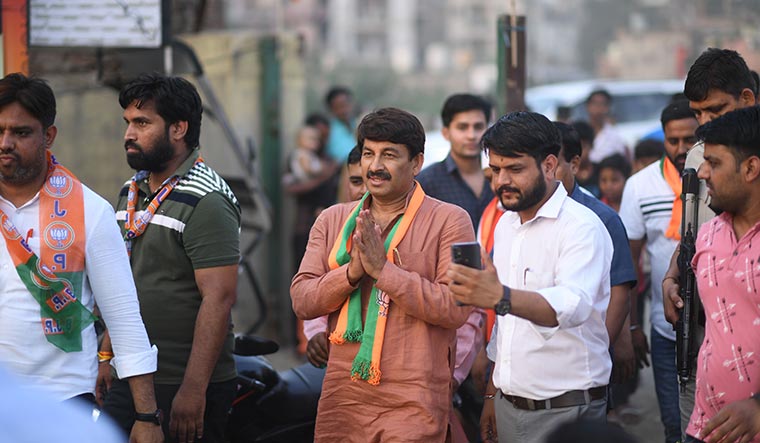 Amplifying modi: BJP’s Manoj Tiwari during his campaign in Timarpur | Kritajna Naik