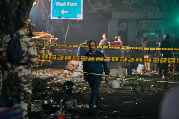 Remnants of a tragedy: Security officials inspect the blast site near Red Fort | AP