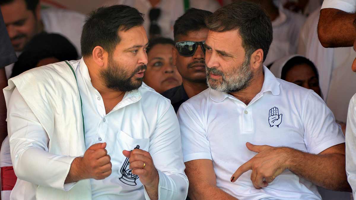 Mutual gain: Rahul Gandhi and Tejashwi Yadav at an INDIA bloc meeting in Patna | PTI
