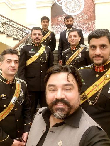 In the cross hairs: Former Pakistani army major Adil Raja with fellow officers of the Pakistan Armoured Corps in 2020. Now in exile in London, Raja has been fighting a case against the ISI in a UK court.
