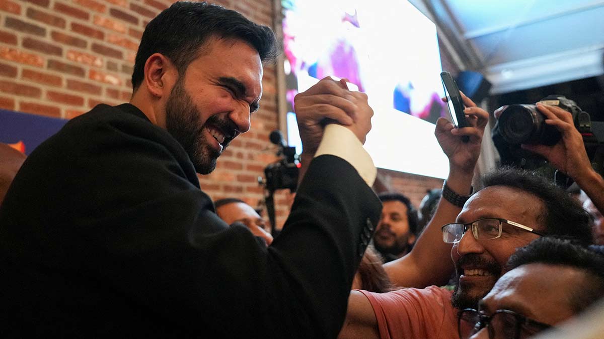 All smiles: Zohran Mamdani greets a supporter during a watch party for his primary election | Reuters