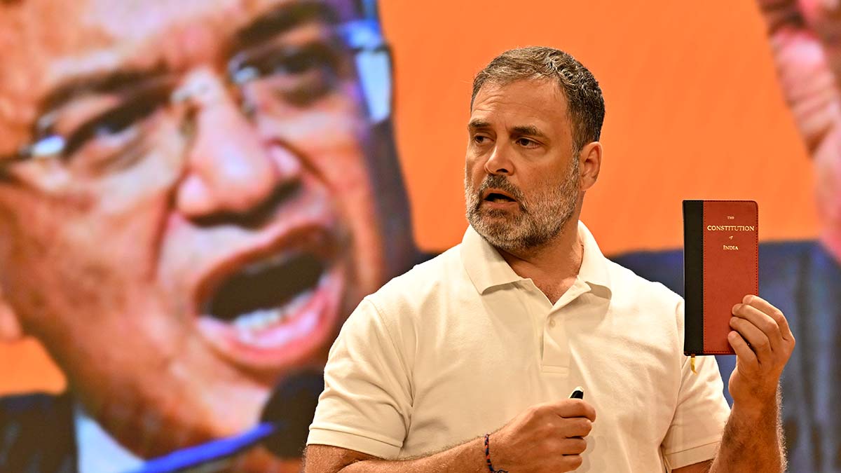 Taking a stand: Rahul Gandhi during the news conference in New Delhi on September 18, where he made more vote theft allegations. A visual of CEC Gyanesh Kumar in the background | Josekutty Panackal