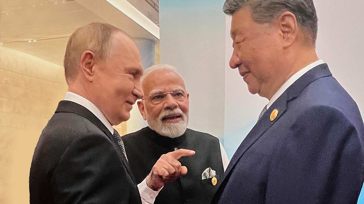 Three to tango: Prime Minister Narendra Modi with Russian President Vladimir Putin (left) and Chinese President Xi Jinping at the Shanghai Cooperation Organisation summit in Tianjin, China | AP
