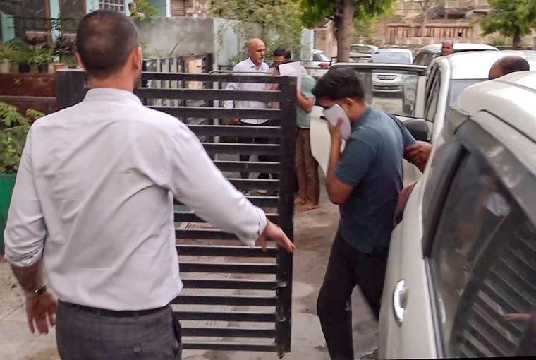Widening probe: A person arrested in the paper leak case being produced before a judge in Jaipur on May 13 | PTI