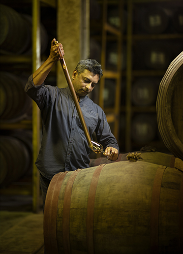 Master distiller Michael D’Souza at work.