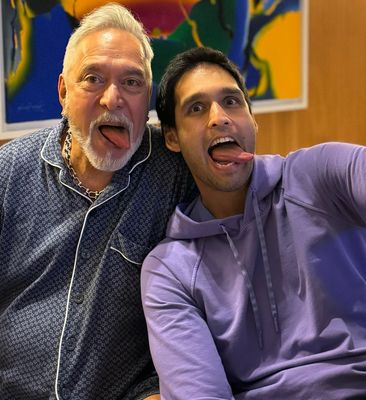 Good times: Sidhartha with dad Vijay on the latter’s birthday.