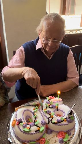 Cutting a cake upon turning 90