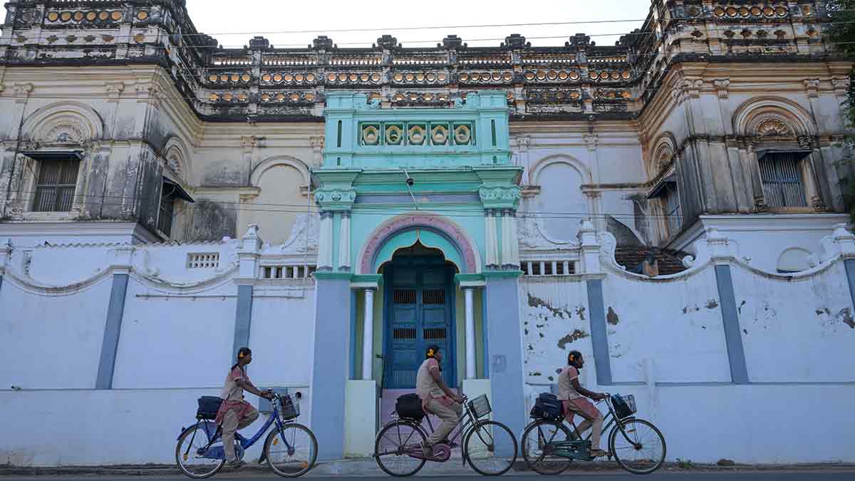 67-Students-cycle-past-a-Chettinad-mansion 67-Students-cycle-past-a-Chettinad-mansion