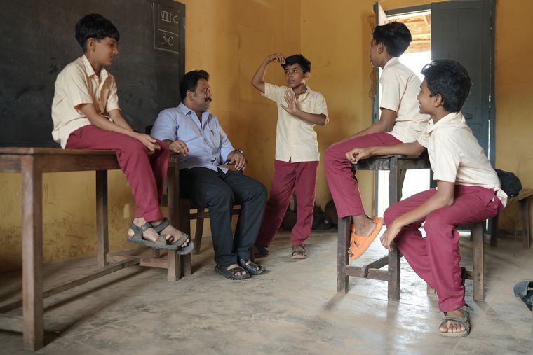 Child’s play: A still from the film in which Sreekuttan (third from right) and his friends interact with CP (played by Aju Varghese).