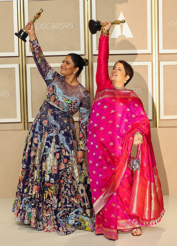 The world’s their stage: Kartiki Gonsalves (left) and Guneet Monga | Reuters