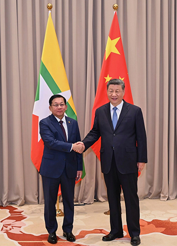 Ties that bind: Myanmar junta chief Senior General Min Aung Hlaing (left) with Chinese President Xi Jinping | AP