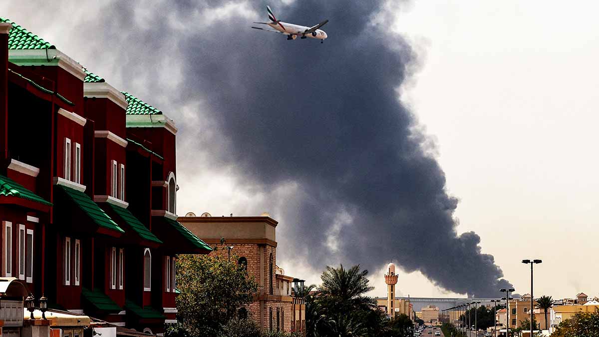 Pall of gloom: Smoke rises from Dubai Airport after an Iranian attack | AFP