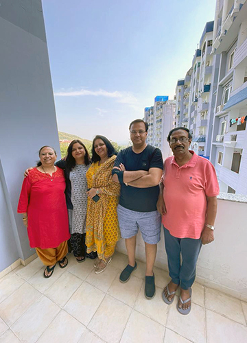 Early movers: Subhash Pokhriyal (second from right) with his family.