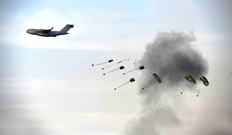 Aid from the air: A supply drop during the Vayu Shakti 2024 exercise at Pokhran | Sanjay Ahlawat