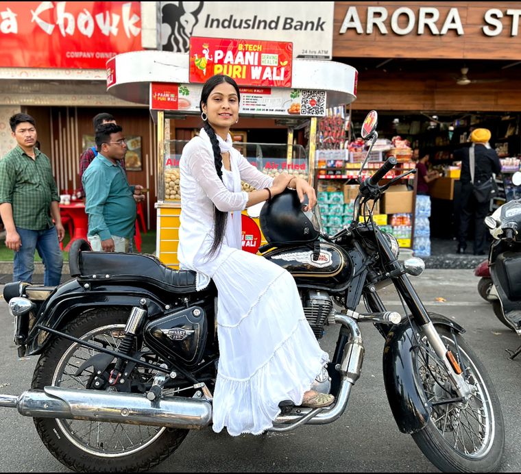 Almost all of Upadhyay’s (with her Royal Enfield Bullet) food carts across India are run by women.