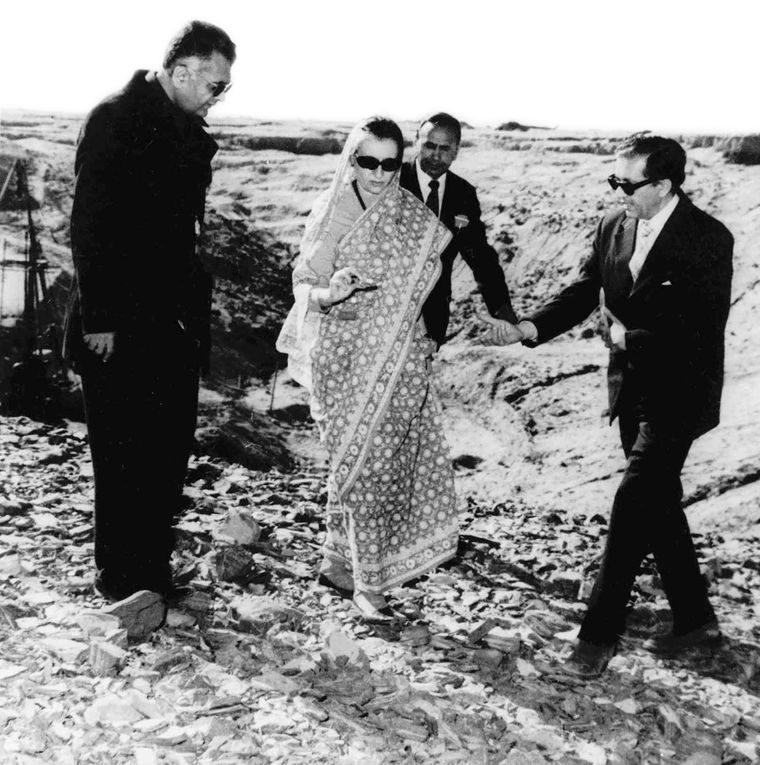 Ground zero: Prime minister Indira Gandhi examines a piece of rock at the Pokhran test site on December 22, 1974. Near Gandhi are Union minister K.C. Pant (left) and Homi Sethna, then chairman of the Atomic Energy Commission | AP