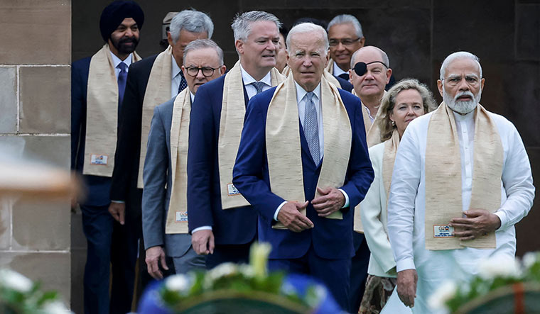 Right ahead: Prime Minister Narendra Modi with US President Joe Biden (centre), German Chancellor Olaf Scholz (third from right) and Australia’s Prime Minister Anthony Albanese (third from left) along with other world leaders at Raj Ghat on the sidelines of the G20 summit in New Delhi on September 10, 2023 | AFP