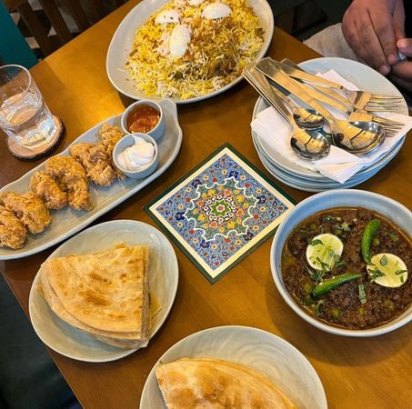 Hyderabadi biryani, mutton keema, parathas and chicken strips