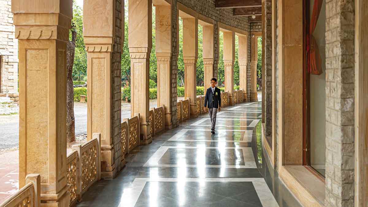 149-a-boy-walks-along-the-school-veranda