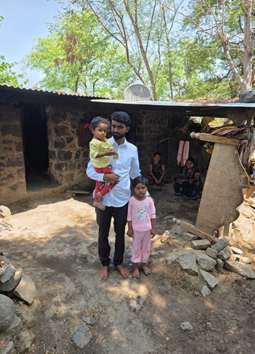 Future tense: Bhagwat Jadhav with the two young daughters of his brother and sister-in-law who committed suicide | Dnyanesh Jathar