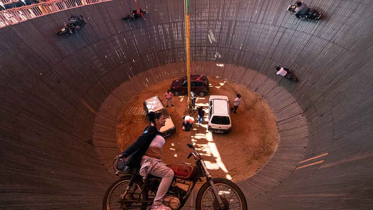 To hell with risk: Riders defy gravity in Maut Ka Kua in Surajkund, near Hazaribag, in Jharkhand.