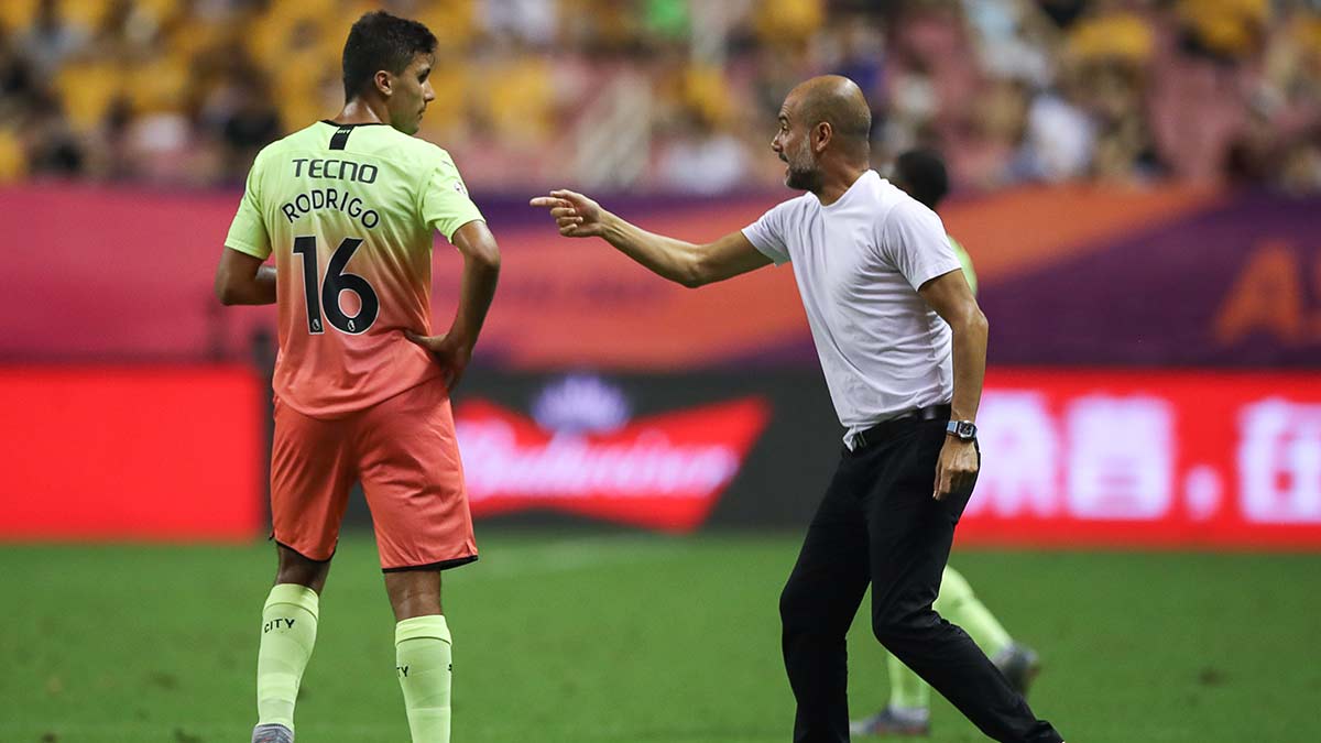 Midfield masterpiece: Guardiola with Rodri in 2019. The defensive midfielder developed rapidly under his fellow Spaniard | Getty Images