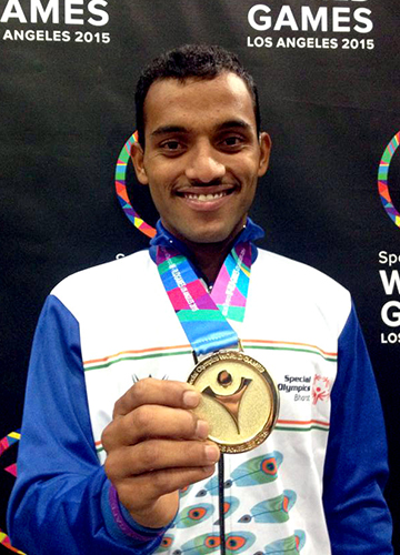 Second chance: Nallabotu Balakrishna, who suffers from almost 90 per cent mental disability, won three medals at the Special Olympics held in Los Angeles in 2015 after receiving training at the RDT.