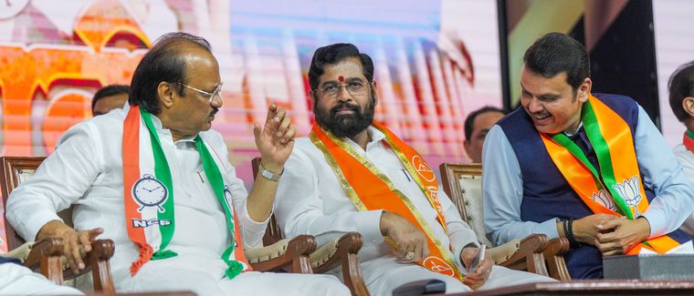 Under pressure: (Left to right) Ajit Pawar, Eknath Shinde and Devendra Fadnavis. The BJP wants to contest 150-160 seats out of 288 | PTI