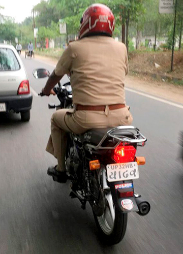 Caste aside: A policeman’s bike with “Yadav” on its number plate, in Lucknow. The bike was issued a ticket after this photo went viral | PTI