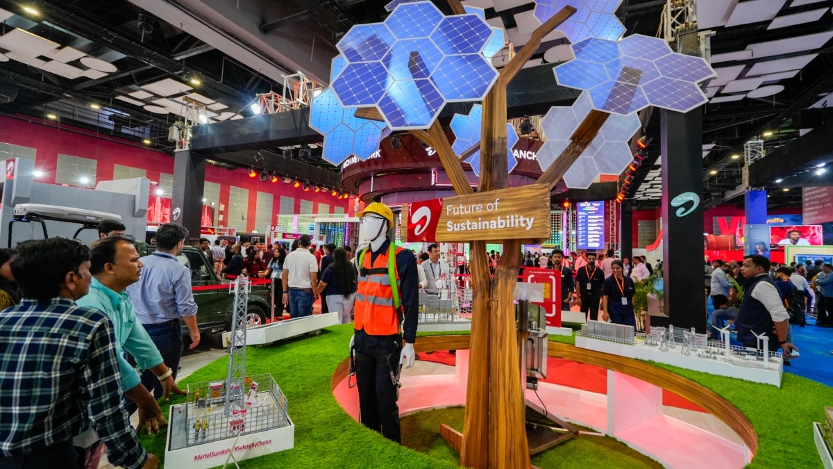 Visitors at a stall at the India Mobile Congress 2024 | PTI