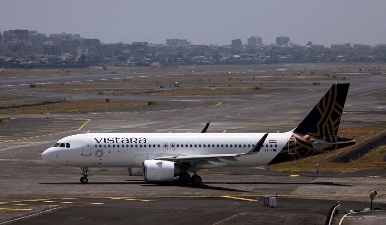 A Vistara passenger aircraft taxis on the tarmac at Chhatrapati Shivaji International Airport in Mumbai | Reuters