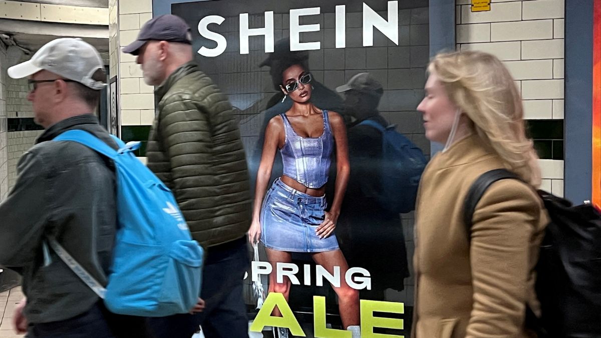 File photo, 2024: People walk past an advertisement for Shein in London | REUTERS 