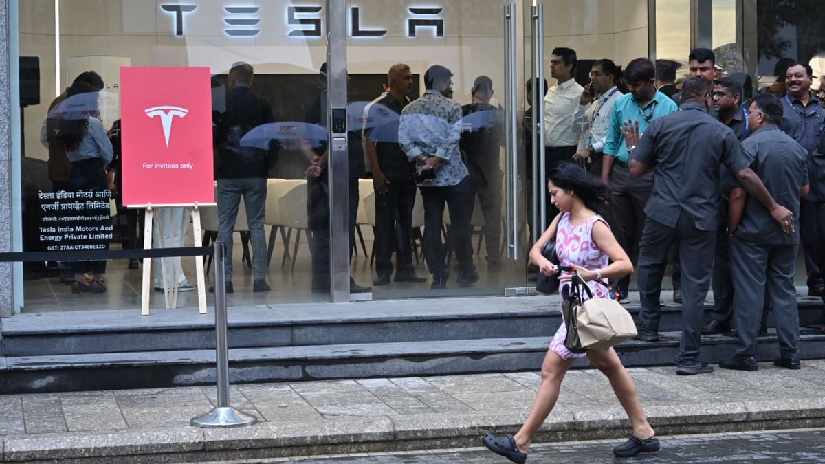 A person walks by the Tesla Experience Centre at BKC in Mumbai on June 15 2025 | Amey Mansabdar