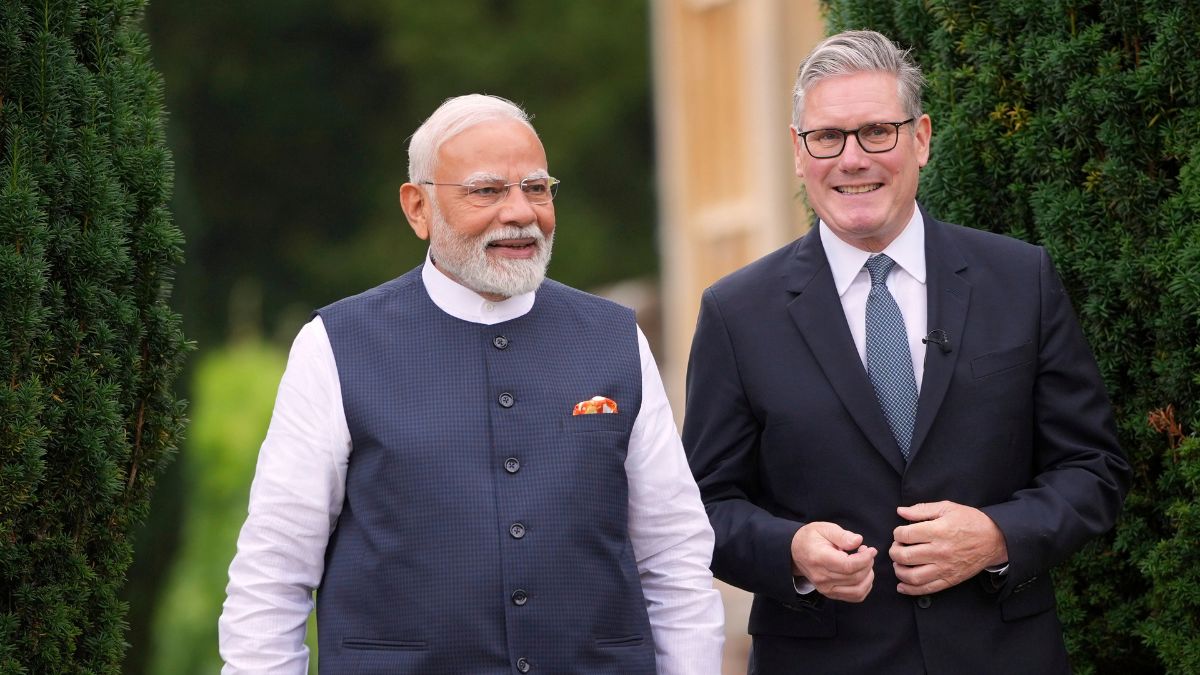 Prime Minister Narendra Modi and British PM Keir Starmer walk in the grounds at Chequers near Aylesbury | AP