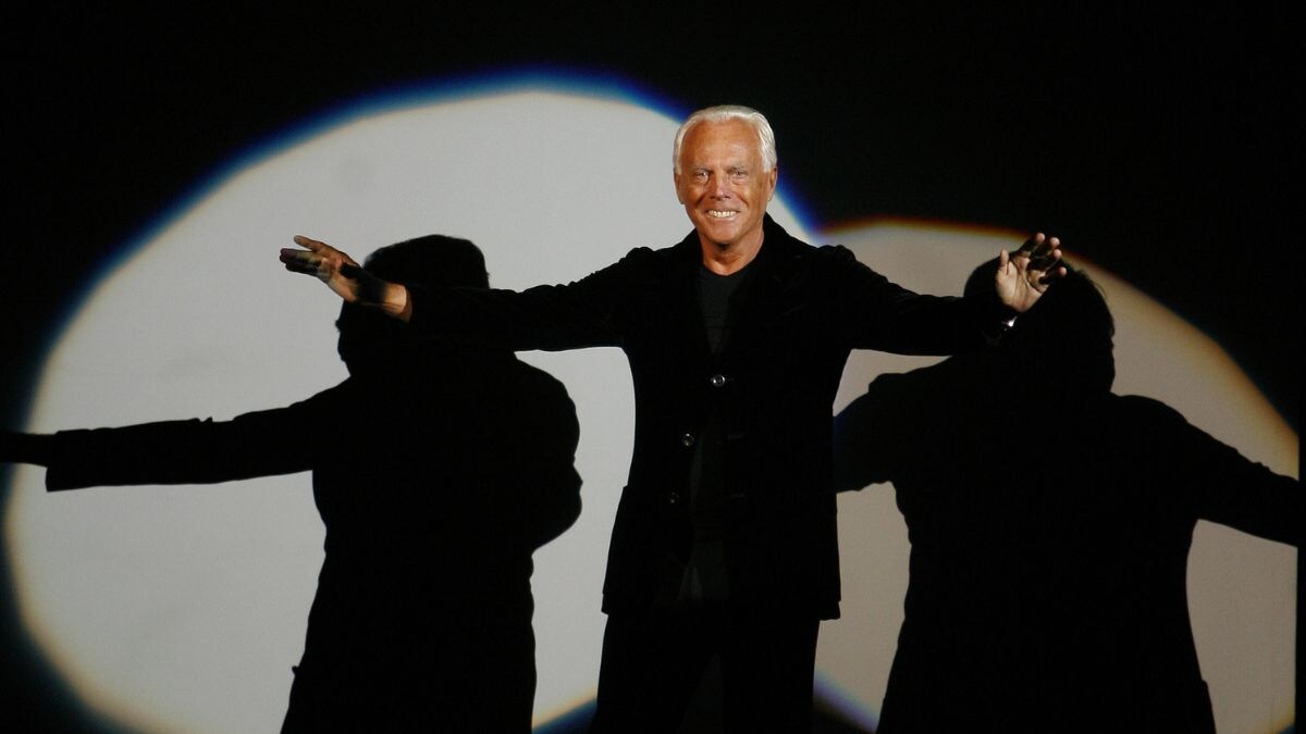 Giorgio Armani receives his share of applause after presenting his Emporio Fall-Winter 2007-2008 men's fashion collection, during the Milan Men's Fashion Week, in Milan, Italy | AP