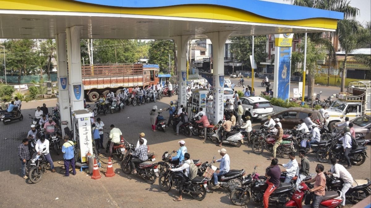 Commuters on twait in a queue outside a fuel station following the rumours of petrol and diesel shortage in Karad, Maharashtra on  March 25, 2026 | PTI 
