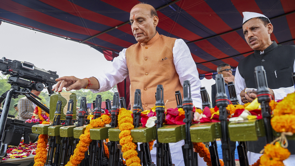 Rajnath Singh with weapons