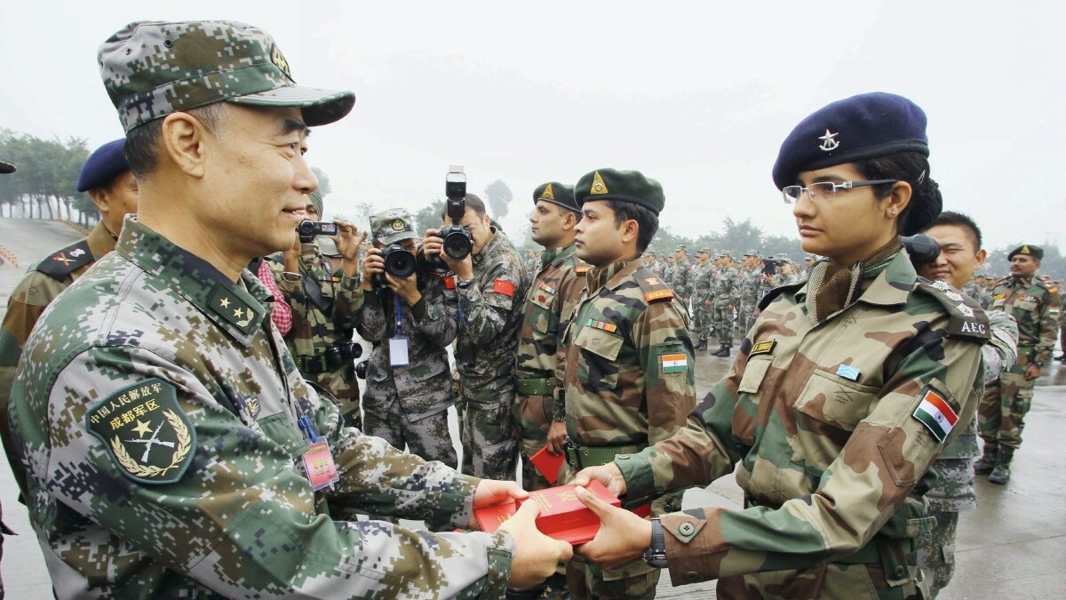 Lieutenant General Zhou Xiaozhou awards the outstanding performers of the Indian contingent at the concluding ceremony of Indo-China joint military exercise 'Hand in Hand 2013' at Chengdu in China's Sichuanan province | PTI