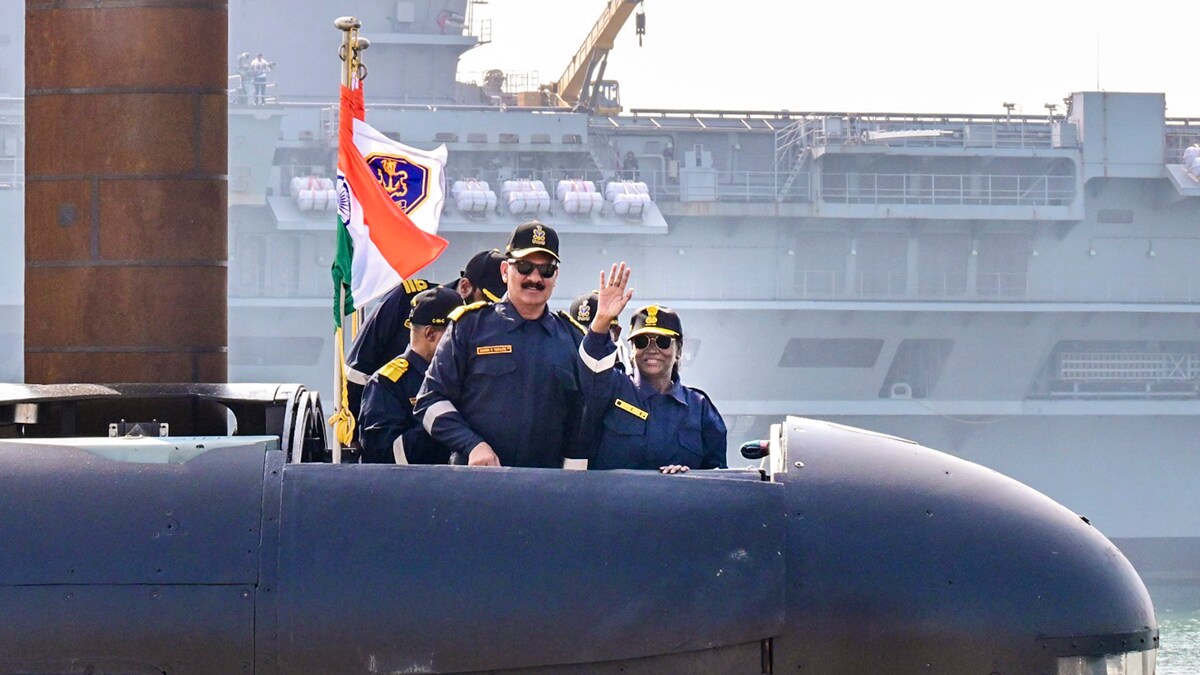 **EDS: THIRD PARTY IMAGE** In this image posted on Dec. 28, 2025, President Droupadi Murmu with Chief of the Naval Staff Admiral Dinesh K. Tripathi during a sortie on the Navy's indigenous Kalvari class submarine INS Vaghsheer at Karwar Naval Base, Karnataka. (@rashtrapatibhvn/X via PTI Photo)(PTI12_28_2025_000073B)
