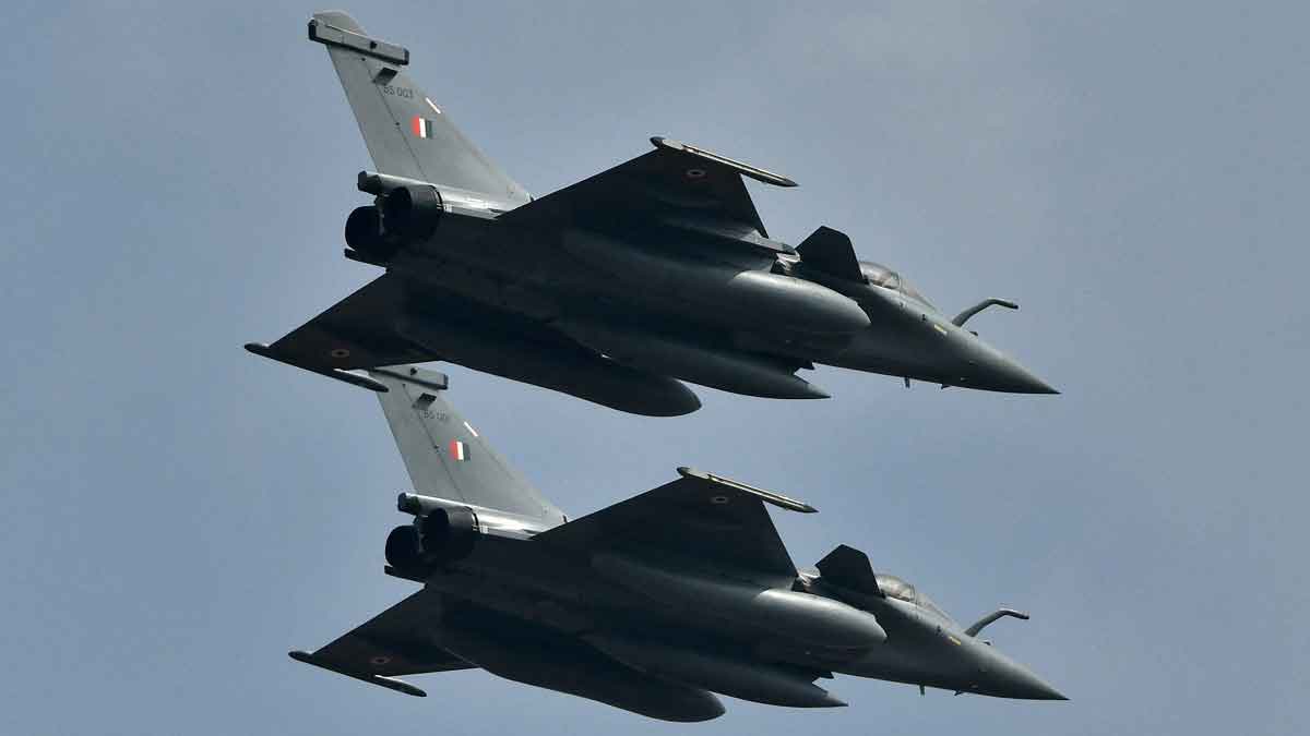 (FILE) Indian Air Force's Rafale fighter jets fly past at Yelahanka air base in Bengaluru, India | Reuters