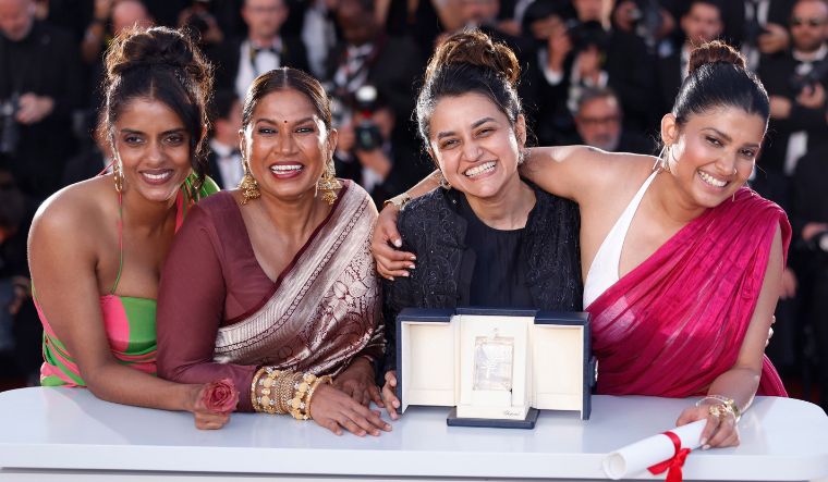 Payal Kapadia, second from right, winner of the grand prize for 'All We Imagine as Light,' poses with Kani Kusruti, from left, Chhaya Kadam, and Divya Prabha at the 77th Cannes international film festival on May 25, 2024 | AP