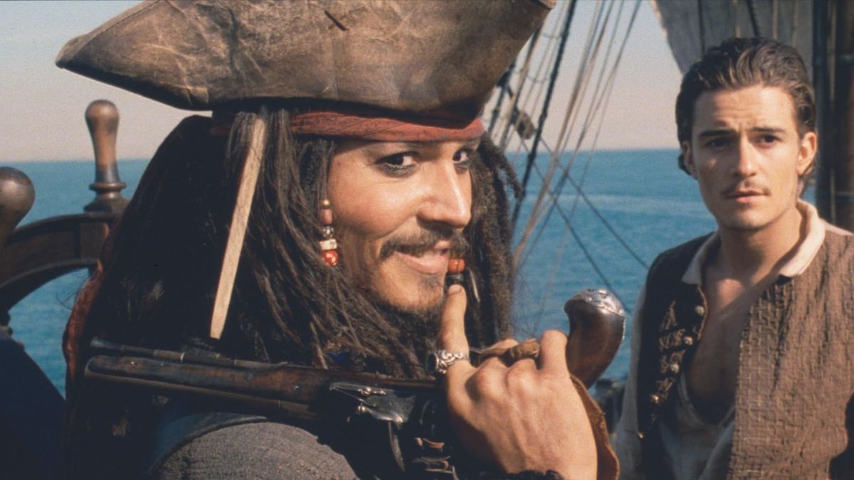 Johnny Depp as Pirate Captain Jack Sparrow (left) and Orlando Bloom in the 2003 film  ‘Pirates of the Caribbean: The Curse of the Black Pearl’ | Buena Vista Pictures