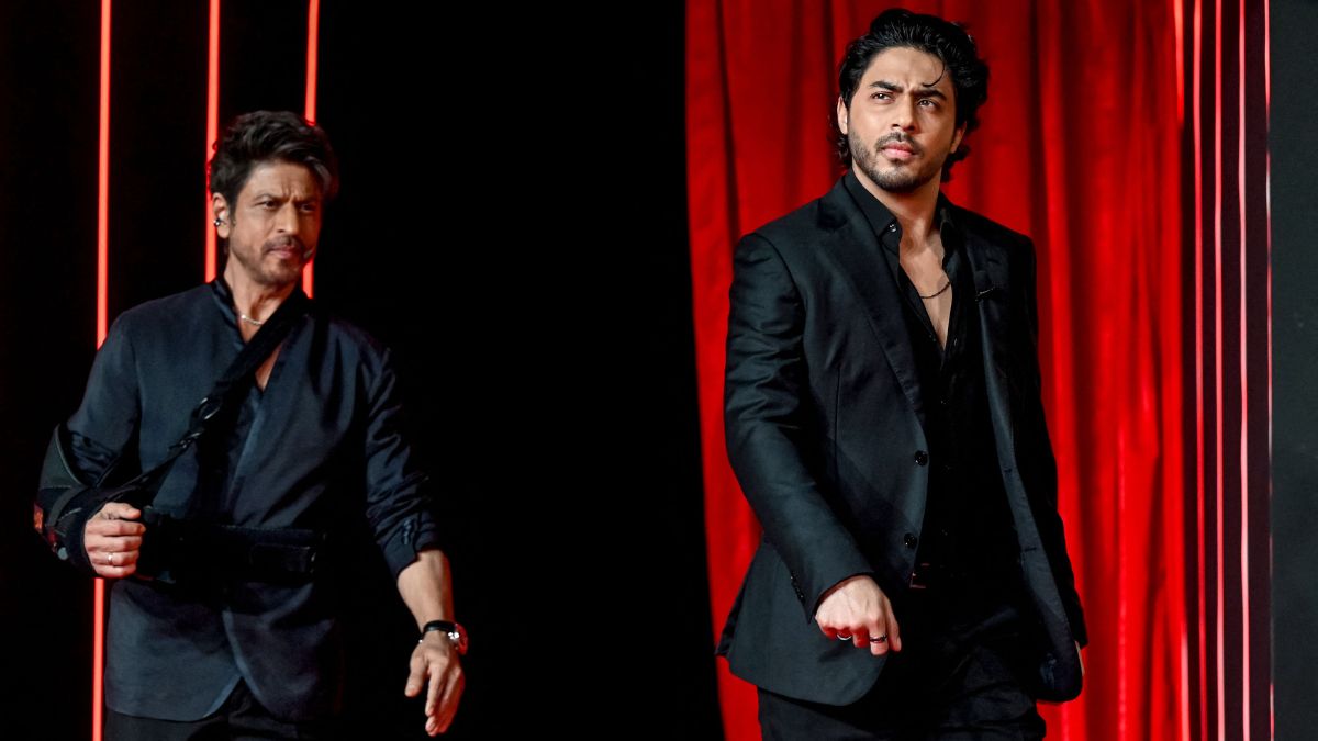 Shah Rukh Khan and Aryan Khan at the teaser launch of 'The Bads of Bollywood' | AFP
