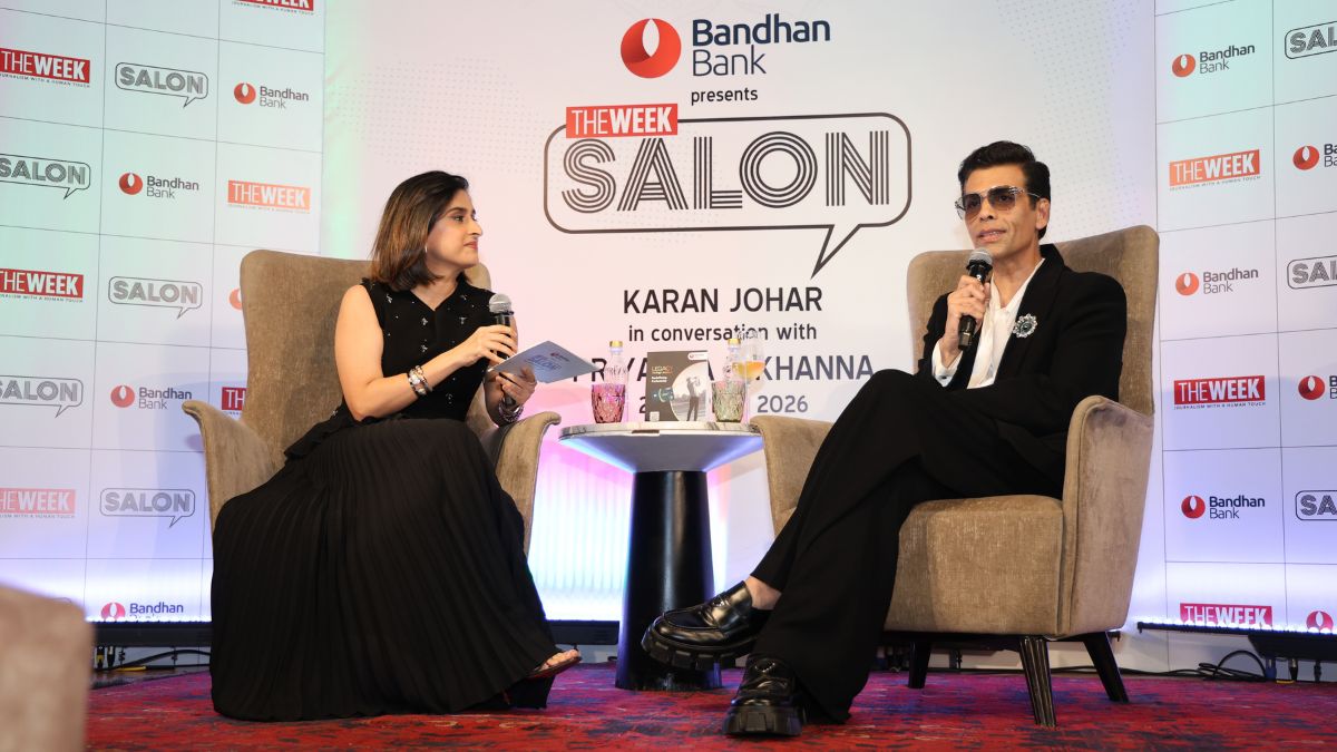 Bollywood filmmaker Karan Johar (R) in conversation with Priyanka R. Khanna at THE WEEK Salon, sponsored by Bandhan Bank