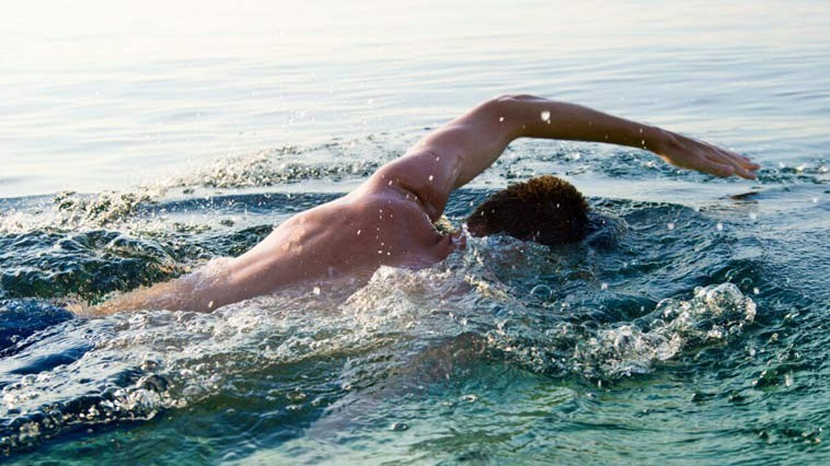 man-swimming-open-water
