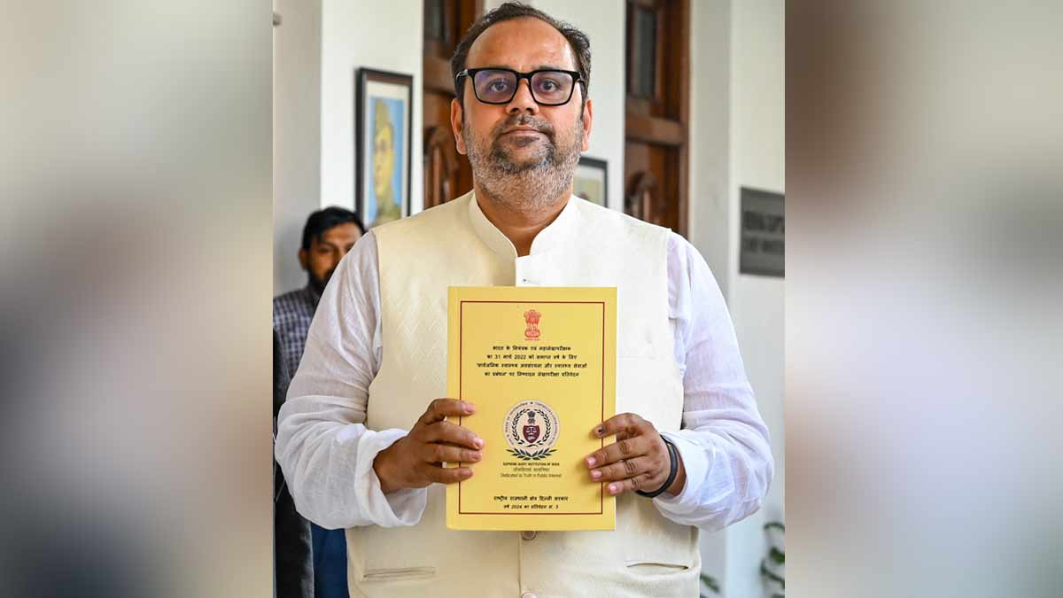 Delhi Health Minister Pankaj Sharma shows a copy of the Comptroller and Auditor Generals (CAG) report, in New Delhi | PTI