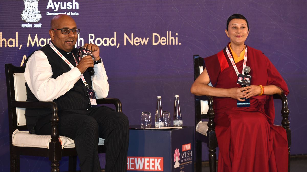Mathew George (L), News Editor at THE WEEK, in conversation with Buddhist nun Lama Aria Drolma (R) at THE WEEK AYUSH Conclave in New Delhi | Sanjay Ahlawat