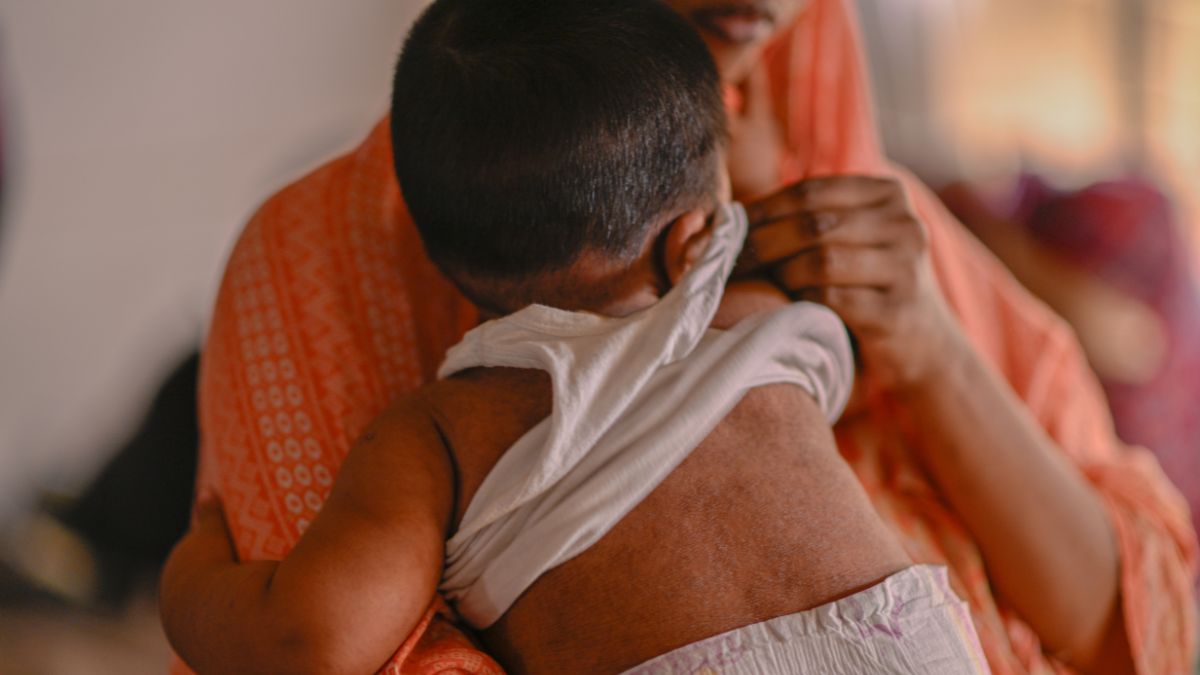 A woman comforts her child receiving treatment for measles at the Infectious Diseases Hospital in Dhaka, Bangladesh | AP